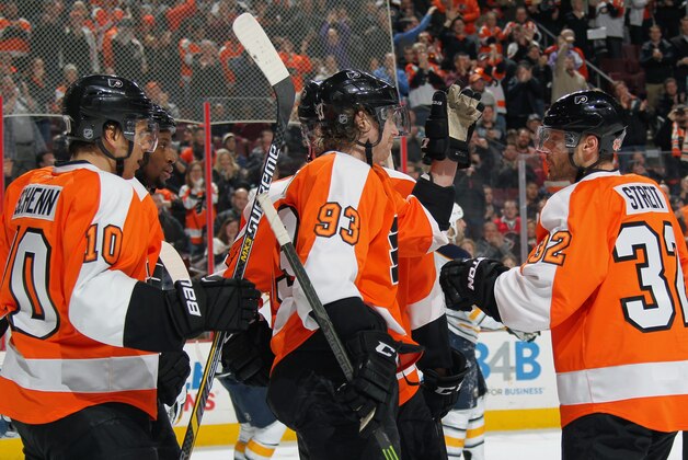 PHILADELPHIA, PA - FEBRUARY 19: Jakub Voracek #93 of the Philadelphia Flyers celebrates his second period power-play goal against the Buffalo Sabres with teammates Brayden Schenn #10 and Mark Streit #32 on February 19, 2015 at the Wells Fargo Center in Philadelphia, Pennsylvania.  (Photo by Len Redkoles/NHLI via Getty Images)