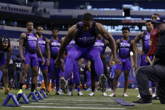 Connecticut defensive back Byron Jones runs a drill at the NFL football scouting combine in Indianapolis, Monday, Feb. 23, 2015. (AP Photo/Julio Cortez)