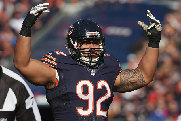 CHICAGO, IL - NOVEMBER 10: Stephen Paea #92 of the Chicago Bears encourages the crowd to cheer during a game against the Detroit Lions at Soldier Field on November 10, 2013 in Chicago, Illinois. The Lions defeated the Bears 21-19. (Photo by Jonathan Daniel/Getty Images)