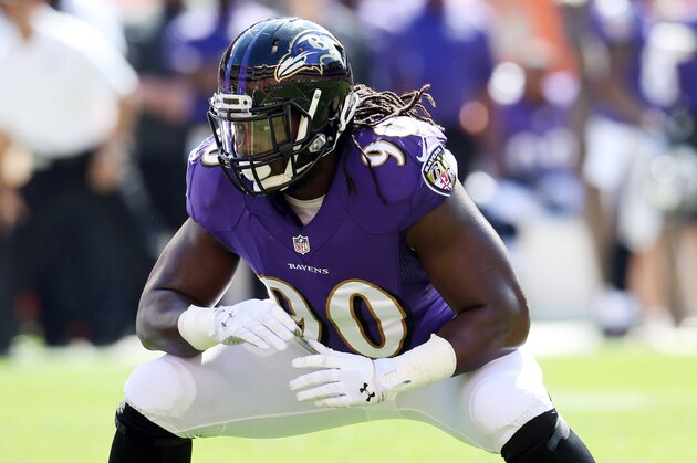 Sep 21, 2014; Cleveland, OH, USA; Baltimore Ravens linebacker Pernell McPhee (90) against the Cleveland Browns during the first quarter at FirstEnergy Stadium. Mandatory Credit: Ron Schwane-USA TODAY Sports