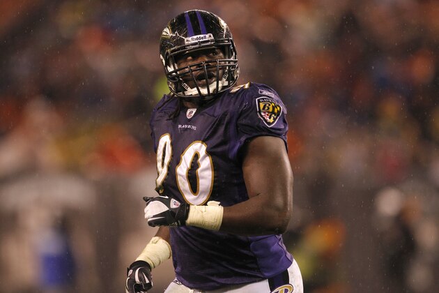 Baltimore Ravens defensive end Pernell McPhee runs off the field after sacking Cleveland Browns quarterback Colt McCoy in the third quarter of an NFL football game on Sunday, Dec. 4, 2011, in Cleveland.  (AP Photo/Amy Sancetta)