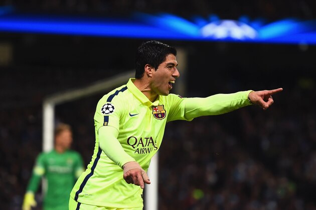 MANCHESTER, ENGLAND - FEBRUARY 24:  Luis Suarez of Barcelona celebrates scoring their second goal during the UEFA Champions League Round of 16 match between Manchester City and Barcelona at Etihad Stadium on February 24, 2015 in Manchester, United Kingdom.  (Photo by Laurence Griffiths/Getty Images)