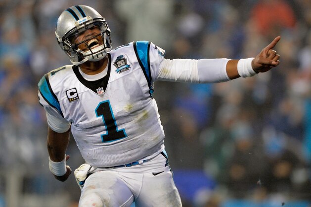 CHARLOTTE, NC - JANUARY 03:  Cam Newton #1 of the Carolina Panthers celebrates a touchdown against the Arizona Cardinals in the 2nd half during their NFC Wild Card Playoff game at Bank of America Stadium on January 3, 2015 in Charlotte, North Carolina.  (Photo by Grant Halverson/Getty Images)