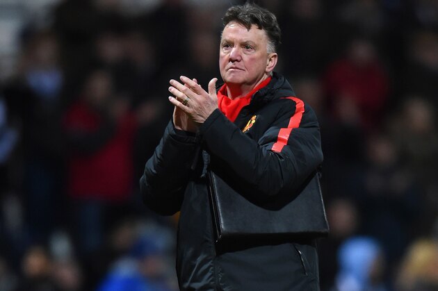 PRESTON, ENGLAND - FEBRUARY 16:  Manager Louis van Gaal of Manchester United applauds the fans during the FA Cup Fifth round match between Preston North End and Manchester United at Deepdale on February 16, 2015 in Preston, England  (Photo by Michael Regan/Getty Images)