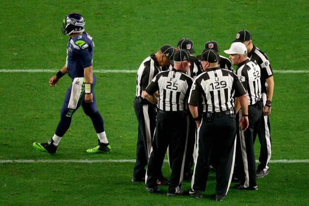 GLENDALE, AZ - FEBRUARY 01:  Russell Wilson #3 of the Seattle Seahawks walks past officials in the second half against the New England Patriots during Super Bowl XLIX at University of Phoenix Stadium on February 1, 2015 in Glendale, Arizona.  (Photo by Mike Ehrmann/Getty Images)