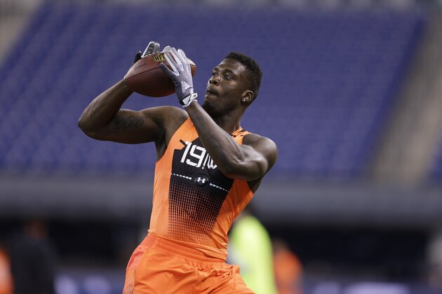 former Missouri wide receiver Dorial Green-Beckham runs a drill at the NFL football scouting combine in Indianapolis, Saturday, Feb. 21, 2015. (AP Photo/David J. Phillip)