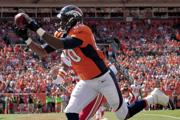 Denver Broncos tight end Julius Thomas (80) pulls in a touchdown pass against the Kansas City Chiefs during the first half of an NFL football game, Sunday, Sept. 14, 2014, in Denver. (AP Photo/Joe Mahoney)