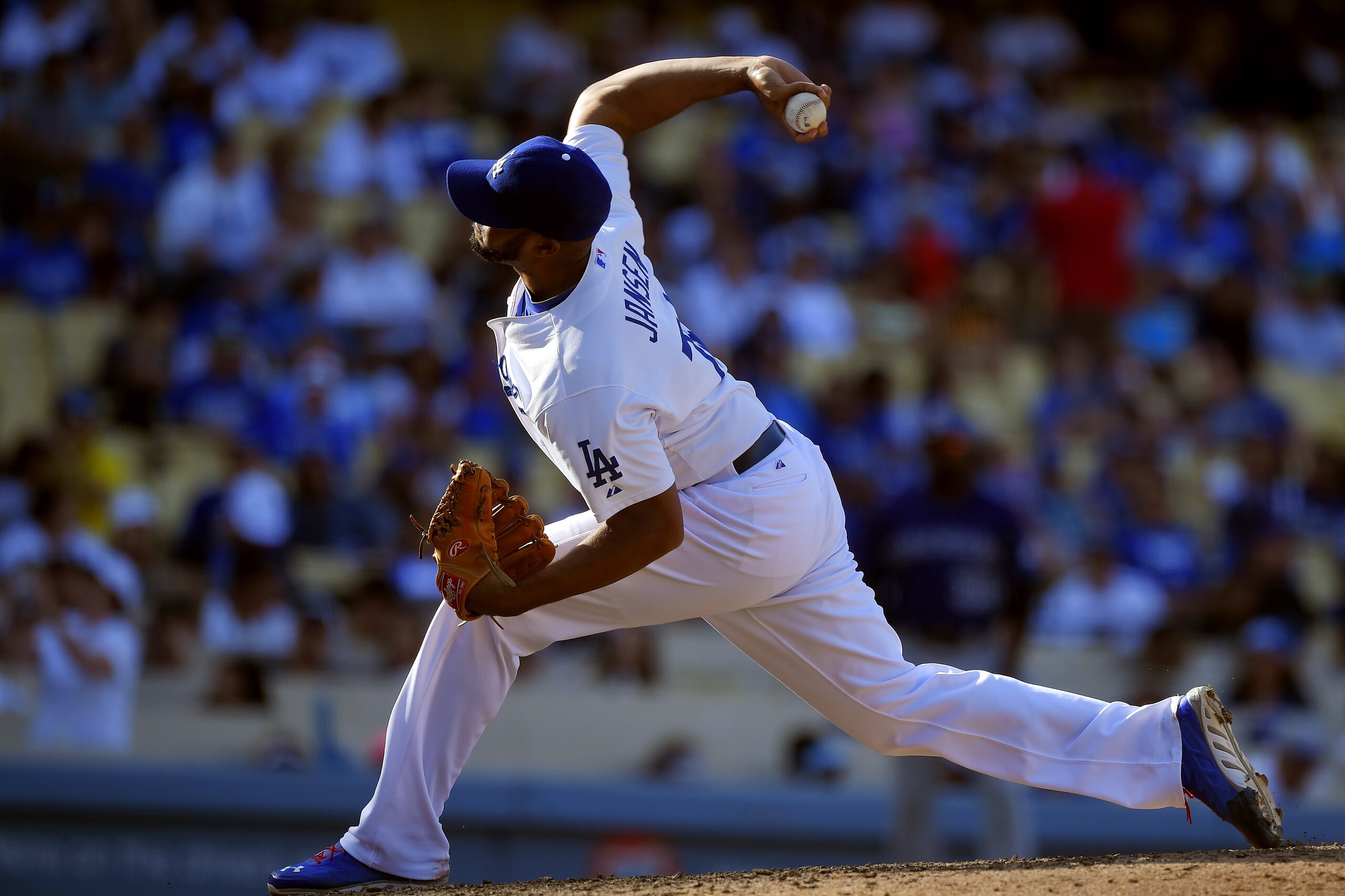 Los Angeles Dodgers relief pitcher Kenley Jansen throws to the plate during the ninth inning of a baseball game against the Colorado Rockies, Sunday, Sept. 28, 2014, in Los Angeles. The Dodgers won 10-5. (AP Photo/Mark J. Terrill)