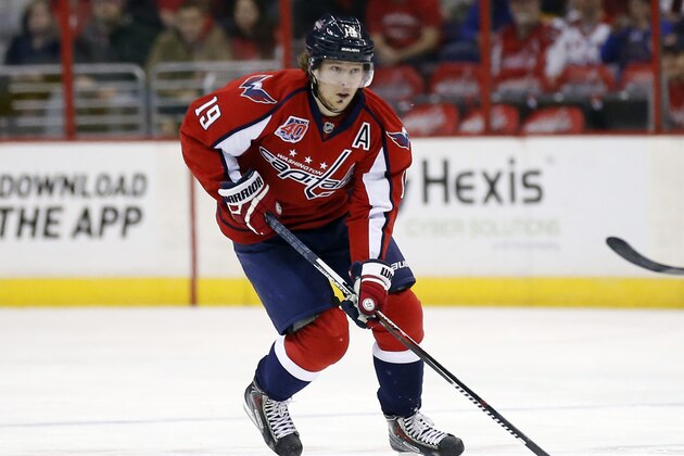 Washington Capitals center Nicklas Backstrom (19), from Sweden, skates with the puck in the first period of an NHL hockey game against the St. Louis Blues, Sunday, Feb. 1, 2015, in Washington. (AP Photo/Alex Brandon)
