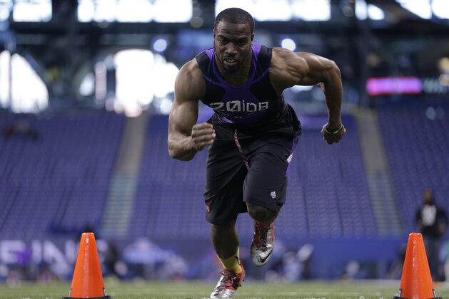 Ohio State defensive back Doran Grant runs a drill at the NFL football scouting combine in Indianapolis, Monday, Feb. 23, 2015. (AP Photo/David J. Phillip)
