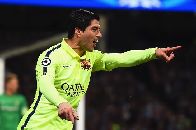 MANCHESTER, ENGLAND - FEBRUARY 24:  Luis Suarez of Barcelona celebrates scoring their second goal during the UEFA Champions League Round of 16 match between Manchester City and Barcelona at Etihad Stadium on February 24, 2015 in Manchester, United Kingdom.  (Photo by Laurence Griffiths/Getty Images)