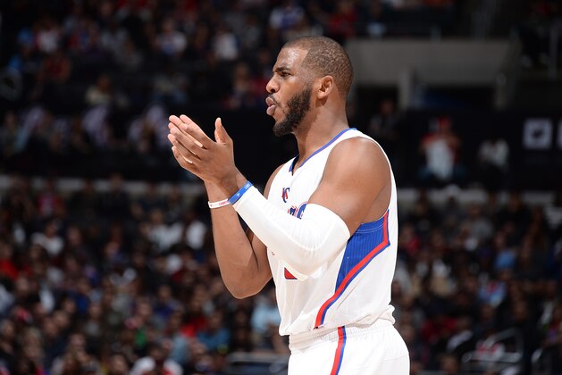 LOS ANGELES, CA - FEBRUARY 21:  Chris Paul #3 of the Los Angeles Clippers celebrates during the game against the Sacramento Kings on February 21, 2015 at STAPLES Center in Los Angeles, California. NOTE TO USER: User expressly acknowledges and agrees that, by downloading and/or using this Photograph, user is consenting to the terms and conditions of the Getty Images License Agreement. Mandatory Copyright Notice: Copyright 2015 NBAE (Photo by Andrew D. Bernstein/NBAE via Getty Images)