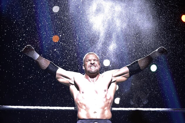 Triple H enters the ring during Wrestlemania XXX at the Mercedes-Benz Super Dome in New Orleans on Sunday, April 6, 2014. (Jonathan Bachman/AP Images for WWE)