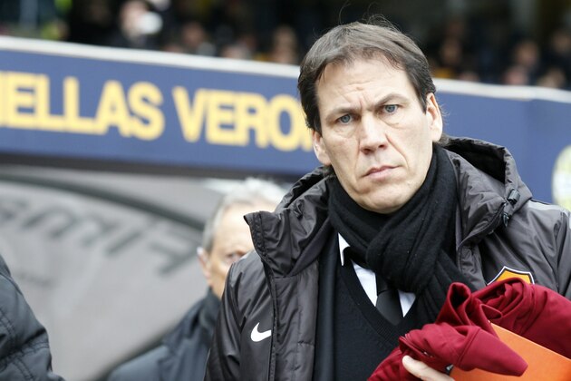 AS Roma's coach Rudi Garcia enters the field prior to a Serie A soccer match against Hellas Verona at Bentegodi stadium in Verona, Italy, Sunday, Feb. 22, 2015. (AP Photo/Felice Calabro')