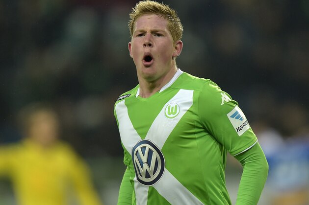 Wolfsburg's Kevin De Bruyne from Belgium celebrates after scoring his second goal during the German Bundesliga soccer match between VfL Wolfsburg and TSG Hoffenheim in Wolfsburg,  Germany, Saturday, Feb. 7, 2015. (AP Photo/Martin Meissner)