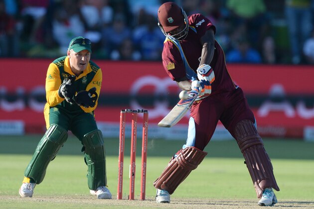 PORT ELIZABETH, SOUTH AFRICA - JANUARY 25:  Andre Russell of West Indies hits a six during the 4th Momentum ODI between South Africa and West Indies at St Georges Park on January 25, 2015 in Port Elizabeth, South Africa. (Photo by Duif du Toit/Gallo Images/Getty Images)