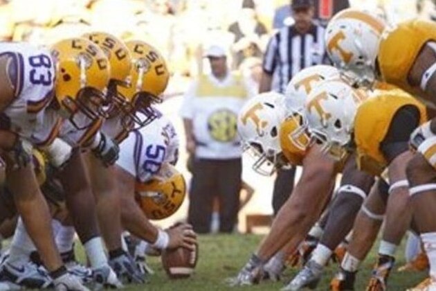 Teams line up during an NCAA college football game betweenLSU  and Tennessee Saturday, Oct. 15, 2011 in Knoxville, Tenn. (AP Photo/Lisa Norman-Hudson)