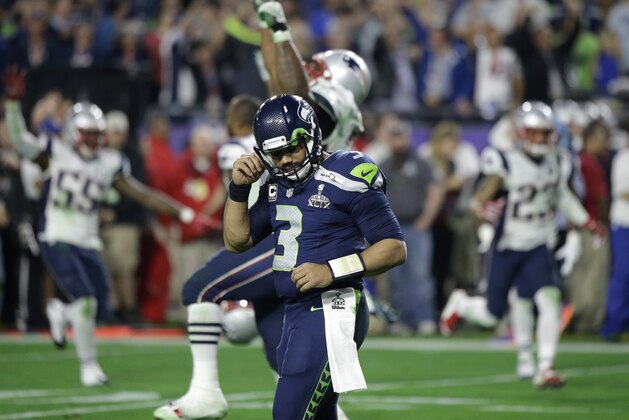 Seattle Seahawks quarterback Russell Wilson (3) reacts after throwing an interception to New England Patriots strong safety Malcolm Butler during the second half of NFL Super Bowl XLIX football game Sunday, Feb. 1, 2015, in Glendale, Ariz. (AP Photo/David Goldman)