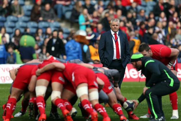 Wales' coach Warren Gatland, top, looks on at his players ahead of their Six Nations rugby union international match at Murrayfield stadium, Edinburgh, Scotland, Sunday Feb. 15, 2015. (AP Photo/Scott Heppell)