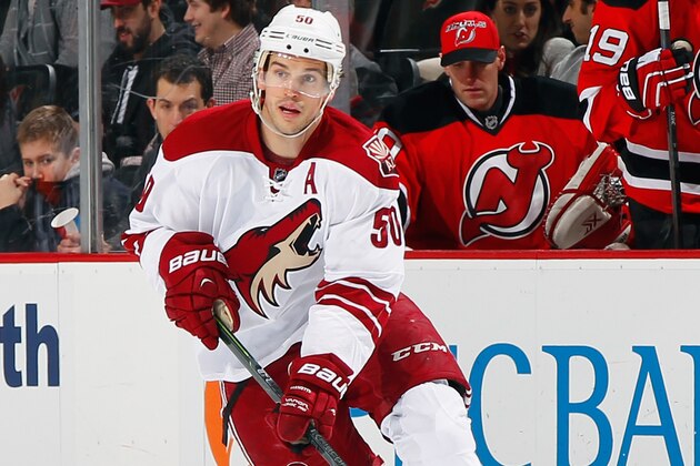NEWARK, NJ - FEBRUARY 23: Antoine Vermette #50 of the Arizona Coyotes controls the puck during the game against the New Jersey Devils at the Prudential Center on February 23, 2015 in Newark, New Jersey. (Photo by Andy Marlin/NHLI via Getty Images)