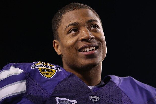 TEMPE, AZ - DECEMBER 28:  Offensive player of the game Tyler Lockett #16 of the Kansas State Wildcats  following the Buffalo Wild Wings Bowl against the Michigan Wolverines at Sun Devil Stadium on December 28, 2013 in Tempe, Arizona. The Wildcats defeated the Wolverines 31-14.  (Photo by Christian Petersen/Getty Images)