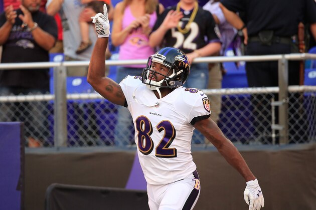 BALTIMORE, MD - AUGUST 07: Wide receiver Torrey Smith #82 of the Baltimore Ravens is introduced before the start of an NFL pre-season game against the San Francisco 49ers at M&T Bank Stadium on August 7, 2014 in Baltimore, Maryland.  (Photo by Rob Carr/Getty Images)