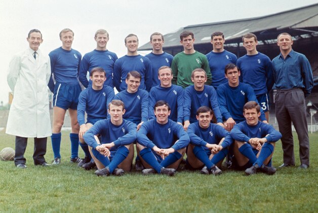 The Chelsea football team pose for a group photograph at Chelsea's Stamford Bridge ground, London, May 12, 1967. The Chelsea team are, from left, back row, trainer Harry Medhurst, Joe Kirkup, unidentified, Ron Harris, Marvin Hinton, Peter Bonetti, unidentified, Eddie McCreadie, and manager Tommy Doherty; middle row, Bobby Tambling, Charlie Cooke, Alan Harris, Tommy Baldwin, and Tony Hateley; front row, Peter Houseman, John Boyle, unidentified, and John Hollins. (AP Photo/Frank Leonard Tewkesbury)