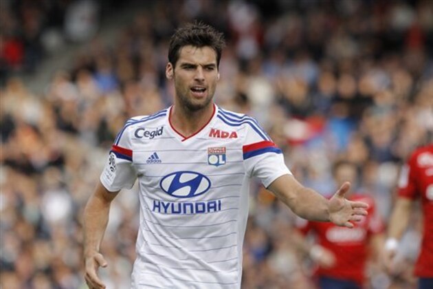 Lyon's Yoann Gourcuff gestures during their French League One soccer match against Lille, in Lyon, central France, Sunday, Oct. 5, 2014. (AP Photo/Laurent Cipriani)
