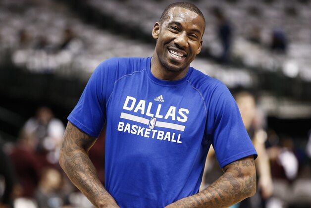Dallas Mavericks' Amar'e Stoudemire smiles during warmups before an NBA basketball game against the Charlotte Hornets, Sunday, Feb. 22, 2015, in Dallas. (AP Photo/Jim Cowsert)