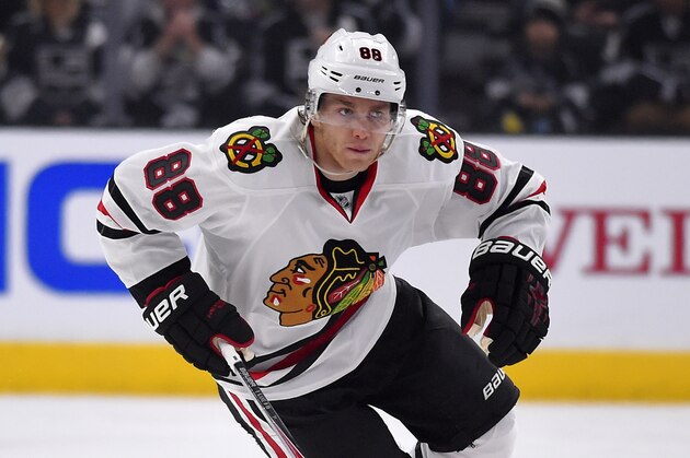Chicago Blackhawks right wing Patrick Kane moves the puck during the first period of an NHL hockey game against the Los Angeles Kings, Wednesday, Jan. 28, 2015, in Los Angeles. (AP Photo/Mark J. Terrill)