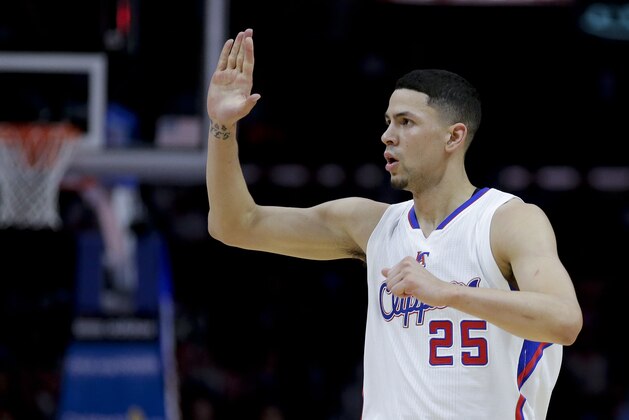 Los Angeles Clippers guard Austin Rivers celebrates against the Sacramento Kings during the first half of an NBA basketball game in Los Angeles, Saturday, Feb. 21, 2015. (AP Photo/Chris Carlson)