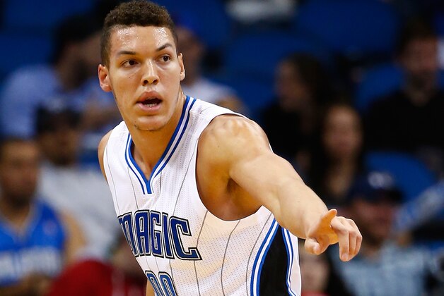 ORLANDO, FL - NOVEMBER 14:  Aaron Gordon #00 of the Orlando Magic points out the defense during the game against the Milwaukee Bucks at Amway Center on November 14, 2014 in Orlando, Florida. The Magic won the game 101-85.  NOTE TO USER: User expressly acknowledges and agrees that, by downloading and/or using this Photograph, user is consenting to the terms and conditions of the Getty Images License Agreement.  (Photo by Sam Greenwood/Getty Images)