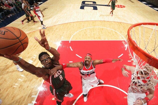 WASHINGTON, DC - NOVEMBER 1: Larry Sanders #8 of the Milwaukee Bucks goes up for a shot against the Washington Wizards at the Verizon Center on November 1, 2014 in Washington, DC. NOTE TO USER: User expressly acknowledges and agrees that, by downloading and or using this photograph, User is consenting to the terms and conditions of the Getty Images License Agreement. (Photo by Ned Dishman/NBAE via Getty Images)