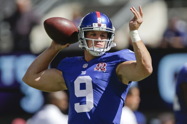 New York Giants quarterback Ryan Nassib (9) warms up before an NFL football game against the Arizona Cardinals Sunday, Sept. 14, 2014, in East Rutherford, N.J.  (AP Photo/Kathy Willens)