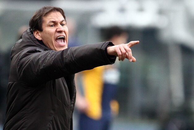 AS Roma's coach Rudi Garcia gestures during a Serie A soccer match against Hellas Verona at Bentegodi stadium in Verona, Italy, Sunday, Feb. 22, 2015. (AP Photo/Felice Calabro')