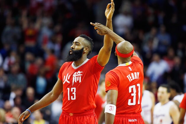 HOUSTON, TX - FEBRUARY 25:  James Harden #13 and Jason Terry #31 of the Houston Rockets reacts to a play during their game against the Los Angeles Clippers at the Toyota Center on February 25, 2015 in Houston, Texas. NOTE TO USER: User expressly acknowledges and agrees that, by downloading and/or using this photograph, user is consenting to the terms and conditions of the Getty Images License Agreement.  (Photo by Scott Halleran/Getty Images)