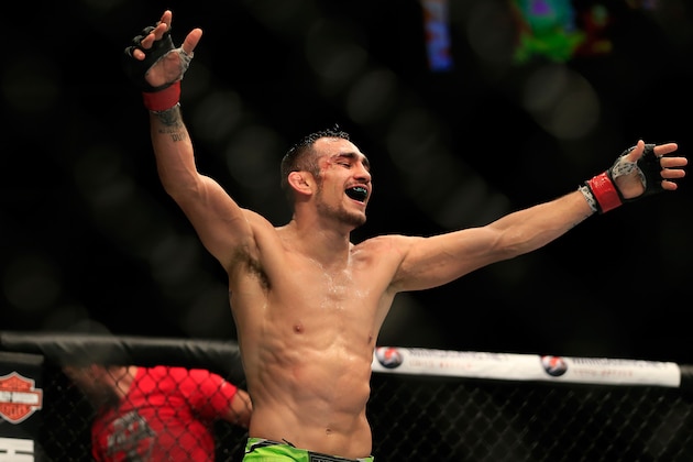 LAS VEGAS, NV - DECEMBER 06:  Tony Ferguson celebrates after defeating Abel Trujillo in their fight during the UFC 181 event at the Mandalay Bay Events Center on December 6, 2014 in Las Vegas, Nevada.  (Photo by Alex Trautwig/Getty Images)