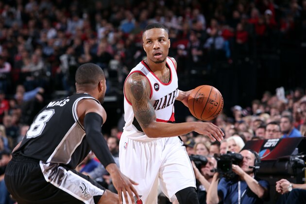 PORTLAND, OR - FEBRUARY 25: Damian Lillard #0 of the Portland Trail Blazers handles the ball against the San Antonio Spurs on February 25, 2015 at the Moda Center in Portland, Oregon. NOTE TO USER: User expressly acknowledges and agrees that, by downloading and or using this Photograph, user is consenting to the terms and conditions of the Getty Images License Agreement. Mandatory Copyright Notice: Copyright 2015 NBAE (Photo by Sam Forencich/NBAE via Getty Images)