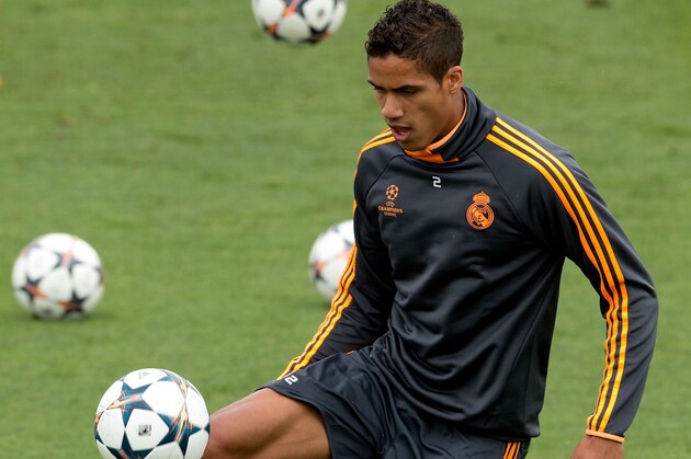 MADRID, SPAIN - MAY 20: Raphael Varane of Real Madrid CF controls the ball during the training session held the Real Madrid media day, prior to UEFA Champions League final against Club Atletico de Madrid, at Valdebebas Sport City on May 20, 2014 in Madrid, Spain.  (Photo by Gonzalo Arroyo Moreno/Getty Images)