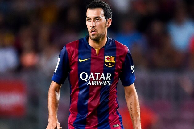 BARCELONA, SPAIN - AUGUST 18:  Sergio Busquets of FC Barcelona runs with the ball during the Joan Gamper Trophy match between FC Barcelona and Club Leon at Camp Nou on August 18, 2014 in Barcelona, Spain.  (Photo by David Ramos/Getty Images)