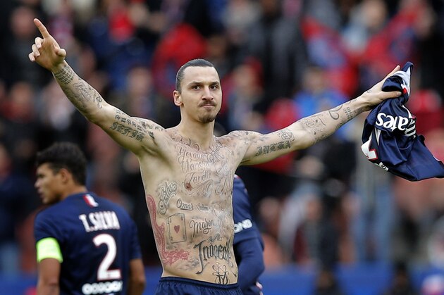 Paris St Germain's Zlatan Ibrahimovic celebrates his goal during the French league one soccer match between PSG and Caen, in Paris, France, Saturday, Feb. 14, 2015. (AP Photo/Christophe Ena)