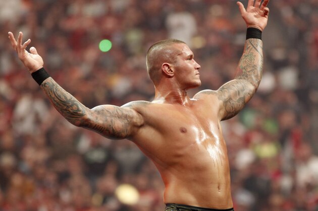 WWE Superstar Randy Orton celebrates victory during WrestleMania XXVI on March 28, 2010, at University of Phoenix Stadium in Glendale, Arizona. (AP Photo/Rick Scuteri)