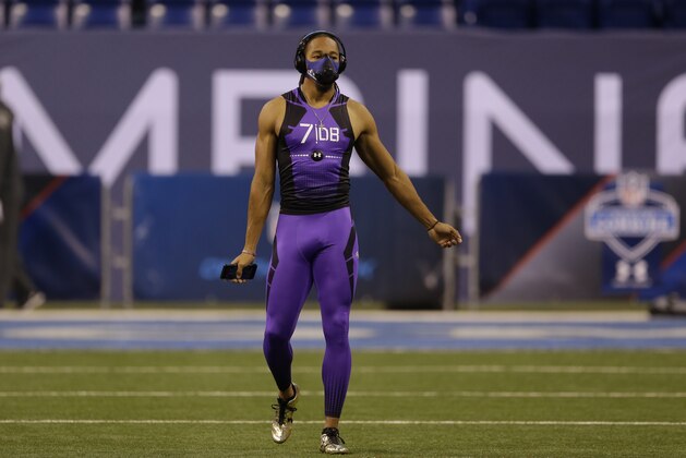 LSU defensive back Jalen Collins stretches before drills at the NFL football scouting combine in Indianapolis, Monday, Feb. 23, 2015. (AP Photo/Julio Cortez)