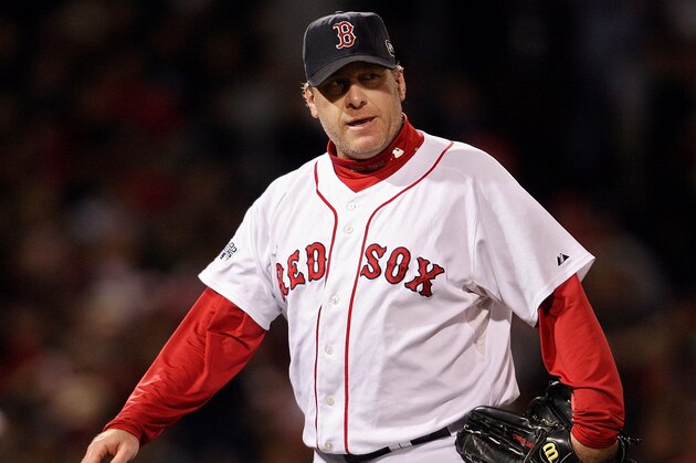 BOSTON - OCTOBER 25:  Curt Schilling #38 of the Boston Red Sox walks off the mound during Game Two of the 2007 Major League Baseball World Series against the Colorado Rockies at Fenway Park on October 25, 2007 in Boston, Massachusetts.  (Photo by Nick Laham/Getty Images)