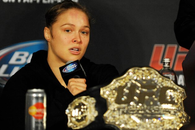 Feb 22, 2014; Las Vegas, NV, USA; UFC women's bantamweight champion Ronda Rousey answers questions from reporters after defending her title against Sara McMann in the first round of the main event of UFC 170 at Mandalay Bay.  Mandatory Credit: Stephen R. Sylvanie-USA TODAY Sports