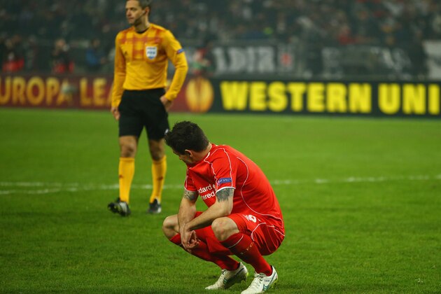 ISTANBUL, TURKEY - FEBRUARY 26:  Dejan Lovren of Liverpool looks dejected as he misses the decisive kick in the penalty shoot out during the UEFA Europa League Round of 32 second leg match between Besiktas JK and Liverpool FC on February 26, 2015 in Istanbul, Turkey.  (Photo by Richard Heathcote/Getty Images)