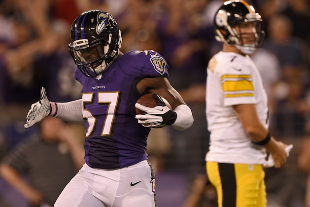 BALTIMORE, MD - SEPTEMBER 11: Inside linebacker C.J. Mosley #57 of the Baltimore Ravens celebrates his fumble recovery in the 4th quarter against the Pittsburgh Steelers at M&T Bank Stadium on September 11, 2014 in Baltimore, Maryland. (Photo by Patrick Smith/Getty Images)