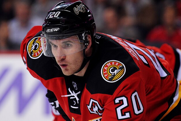 CALGARY, AB - OCTOBER 21: Curtis Glencross #20 of the Calgary Flames in action against the Tampa Bay Lightning during an NHL game at Scotiabank Saddledome on October 21, 2014 in Calgary, Alberta, Canada. Tampa Bay Lightning defeated the Calgary Flames 2-1 in overtime. (Photo by Derek Leung/Getty Images)