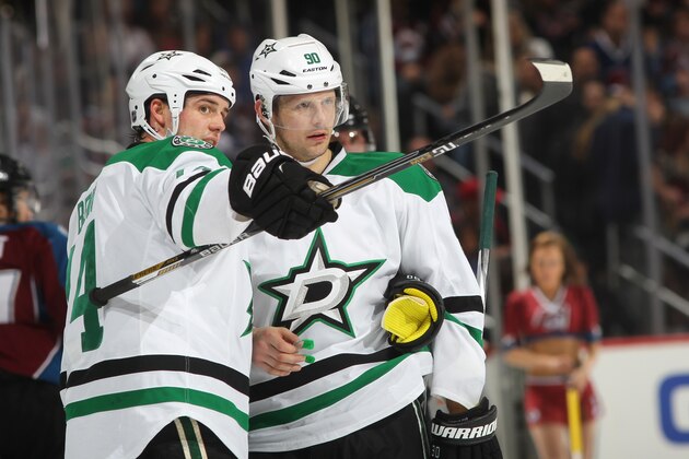 DENVER, CO - FEBRUARY 14: Jamie Benn #14 and Jason Spezza #90 of the Dallas Stars talk during a break in the action against the Colorado Avalanche at the Pepsi Center on February 14, 2015 in Denver, Colorado.  (Photo by Michael Martin/NHLI via Getty Images)