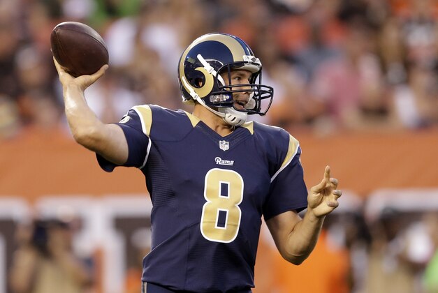 St. Louis Rams quarterback Sam Bradford passes in the first quarter of a preseason NFL football game against the Cleveland Browns Saturday, Aug. 23, 2014, in Cleveland. (AP Photo/Tony Dejak)